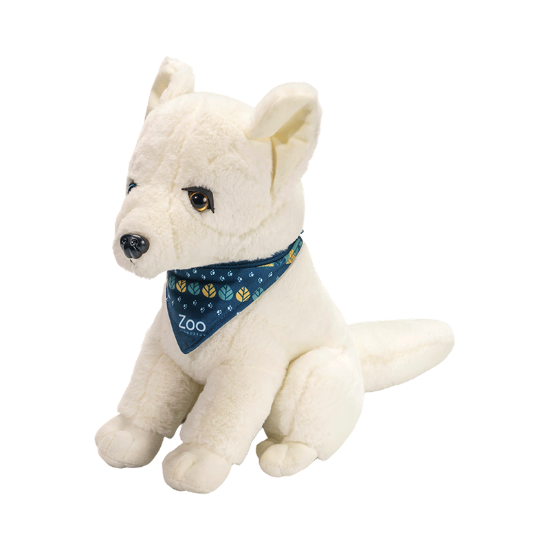 Juguetes de peluche de lobo de nieve sentados con animales salvajes