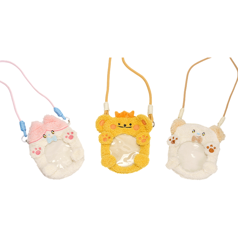 Tarjeteros de peluche con forma de cabeza real